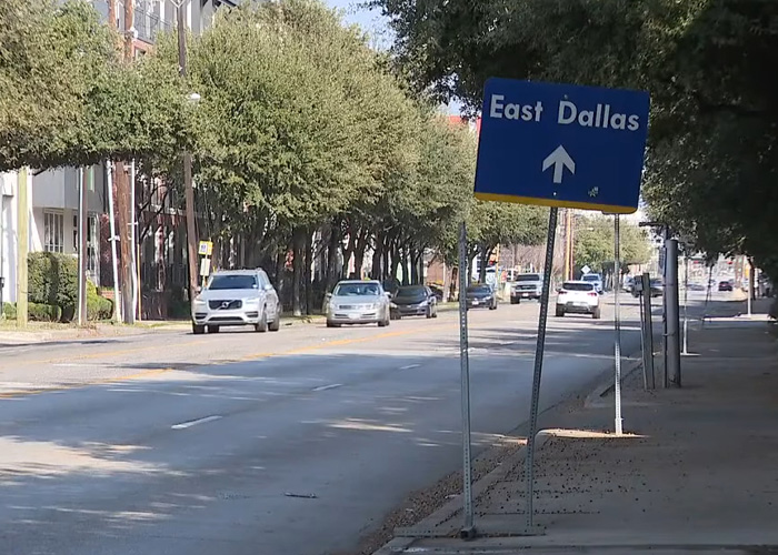 East Dallas street sign and cars on road, photo for Dallas missing persons case coverage East Dallas street sign and cars on road, photo for Dallas missing persons case coverage