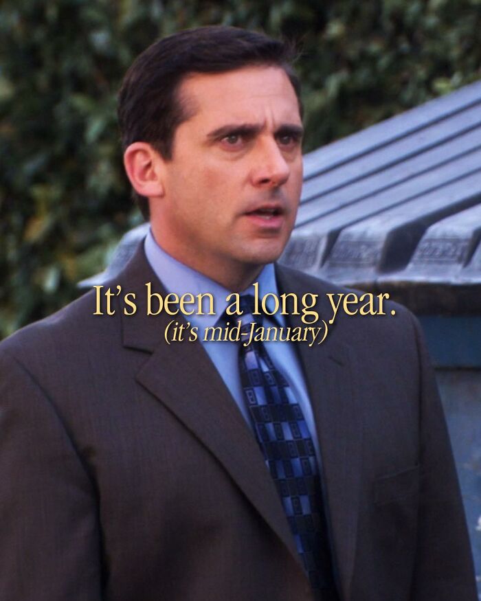 Michael Scott from The Office looking serious with meme text about the year feeling long in a scene outdoors near a dumpster.