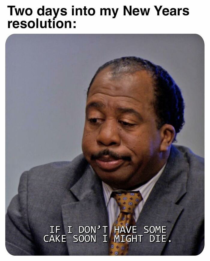 Man in a suit from The Office meme, looking disappointed with text about New Years resolution and craving cake humor.