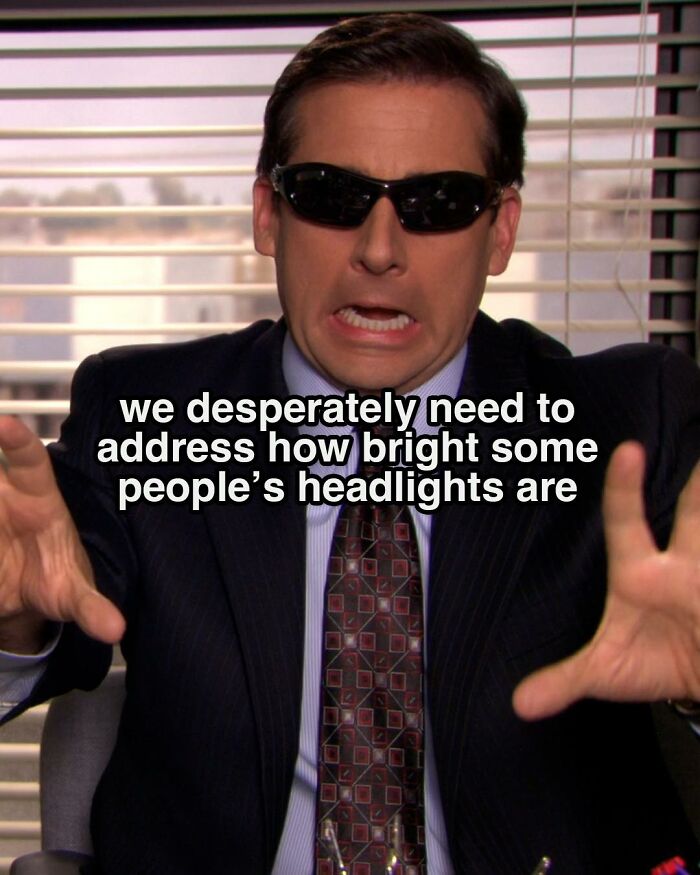 Man in sunglasses making a funny expression in a meme inspired by the TV series The Office about headlights.