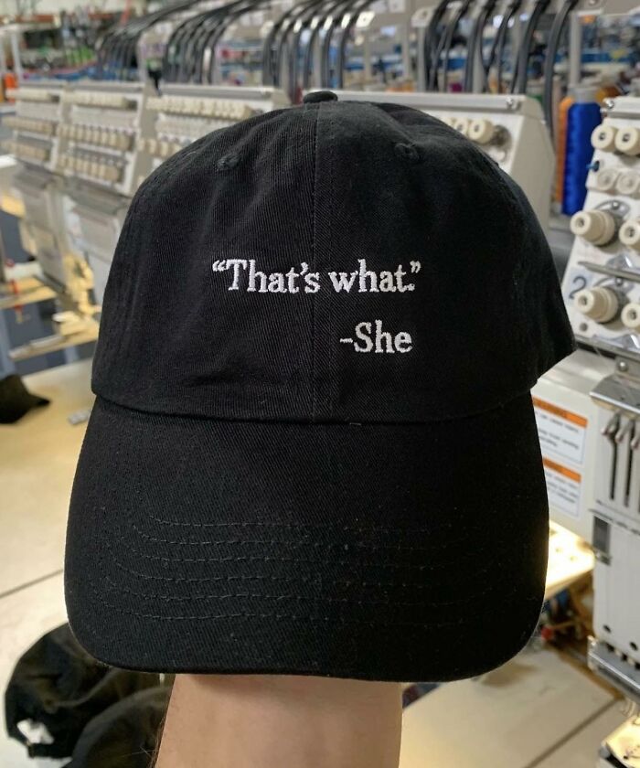 Black baseball cap with embroidered meme phrase inspired by The Office popular TV series humor on front panel.