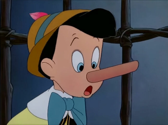 Pinocchio with an elongated nose showing a moment that hits people harder than they’d like to admit about normal behavior.