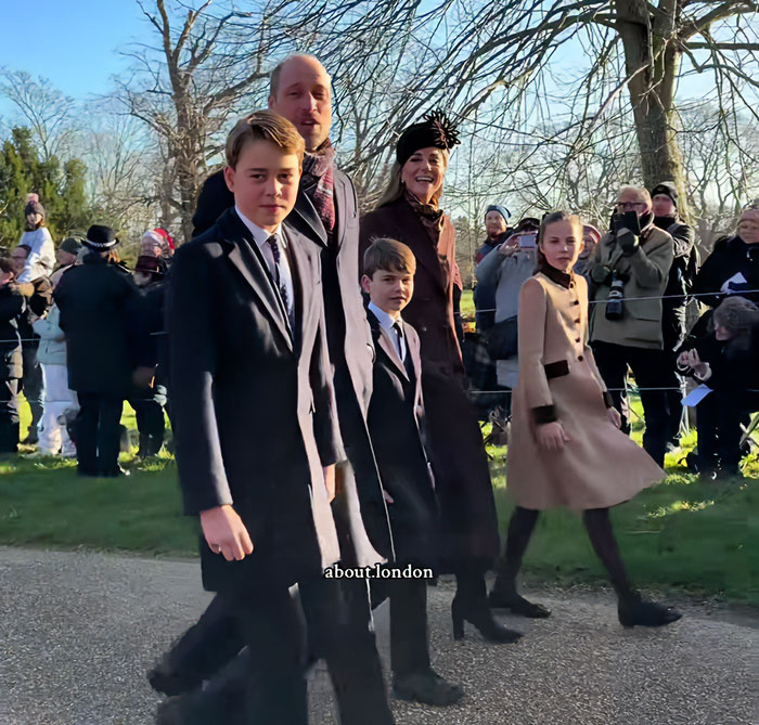 Royal father with his children walking together in a crowd at a sunny outdoor event