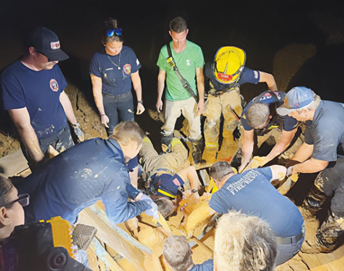 Rescue team working at night to free Florida man trapped in the mud after vanishing on Valentine's Day.