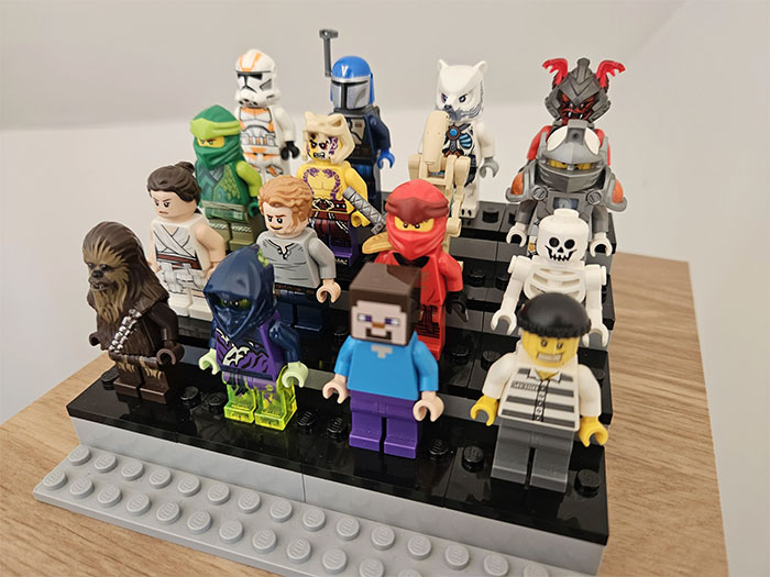 Collection of expensive Lego sets displayed on a stand, linked to cheating ex-wife's boyfriend theft and arrest.