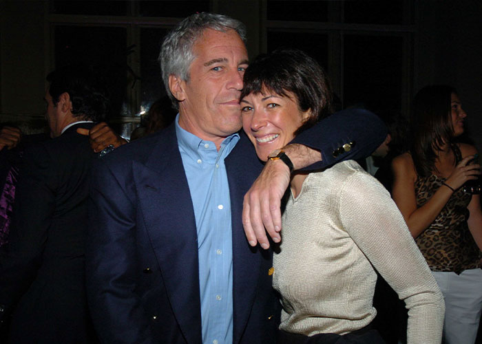 Man in blue blazer and woman in beige top posing closely at an event, related to Ghislaine Maxwell and Madeleine McCann abductor sketch debate. Man in blue blazer and woman in beige top posing closely at an event, related to Ghislaine Maxwell and Madeleine McCann abductor sketch debate.