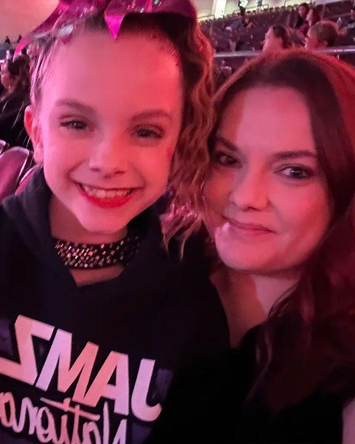 Young dancer and her mother at an event, highlighting Utah dance mom&rsquo;s mean texts and parent clash in Vegas tragedy context.