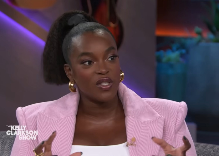 Woman on the Kelly Clarkson Show discussing fans stunned by Michael B. Jordan’s face transformation for Sinners Twins role.