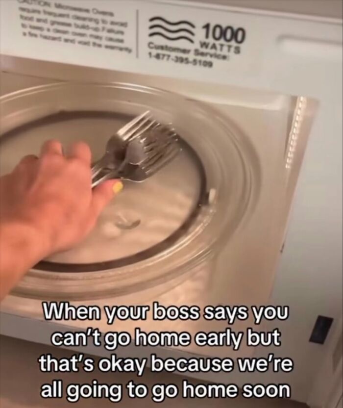Hand placing forks inside a microwave with a caption about going home early, representing entertaining and unhinged memes.