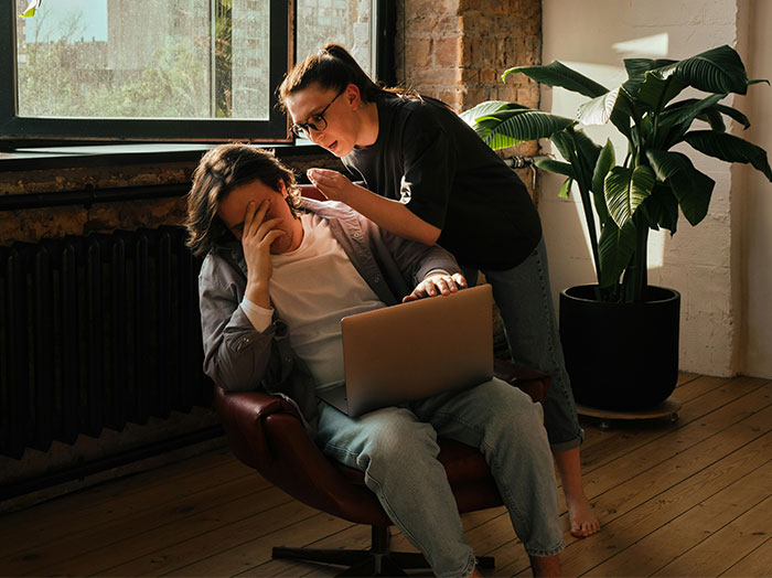 Woman confronts late husband's brother about wearing his clothes and using his stuff in a tense home setting.