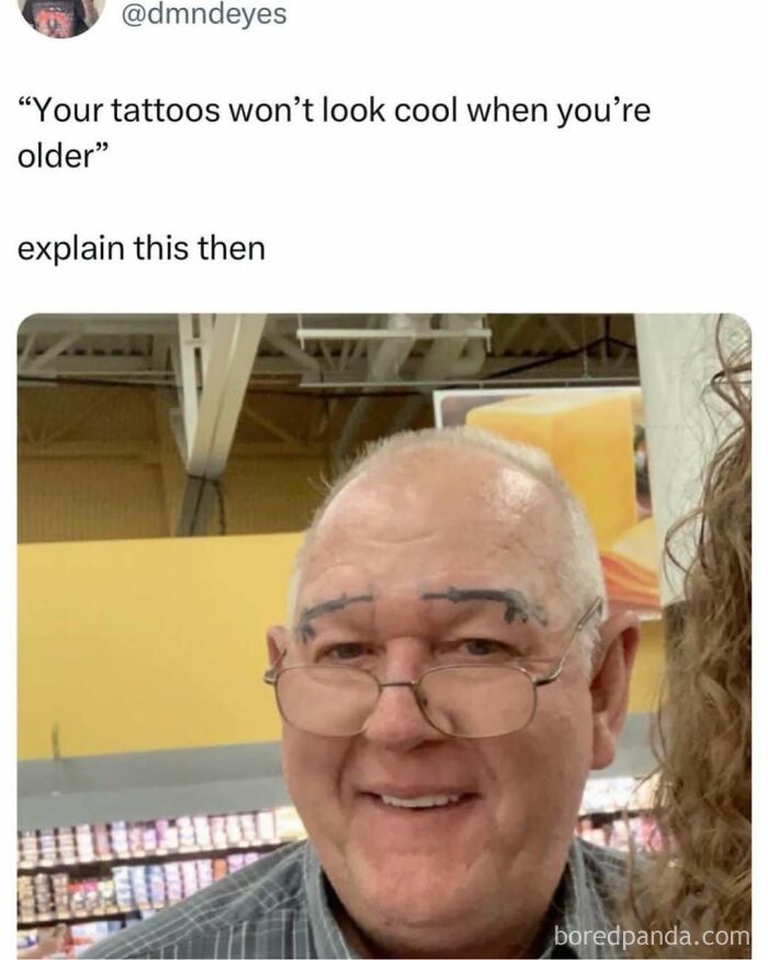 Older man with eyebrow tattoos smiling in a grocery store, a funny and entertaining random meme.