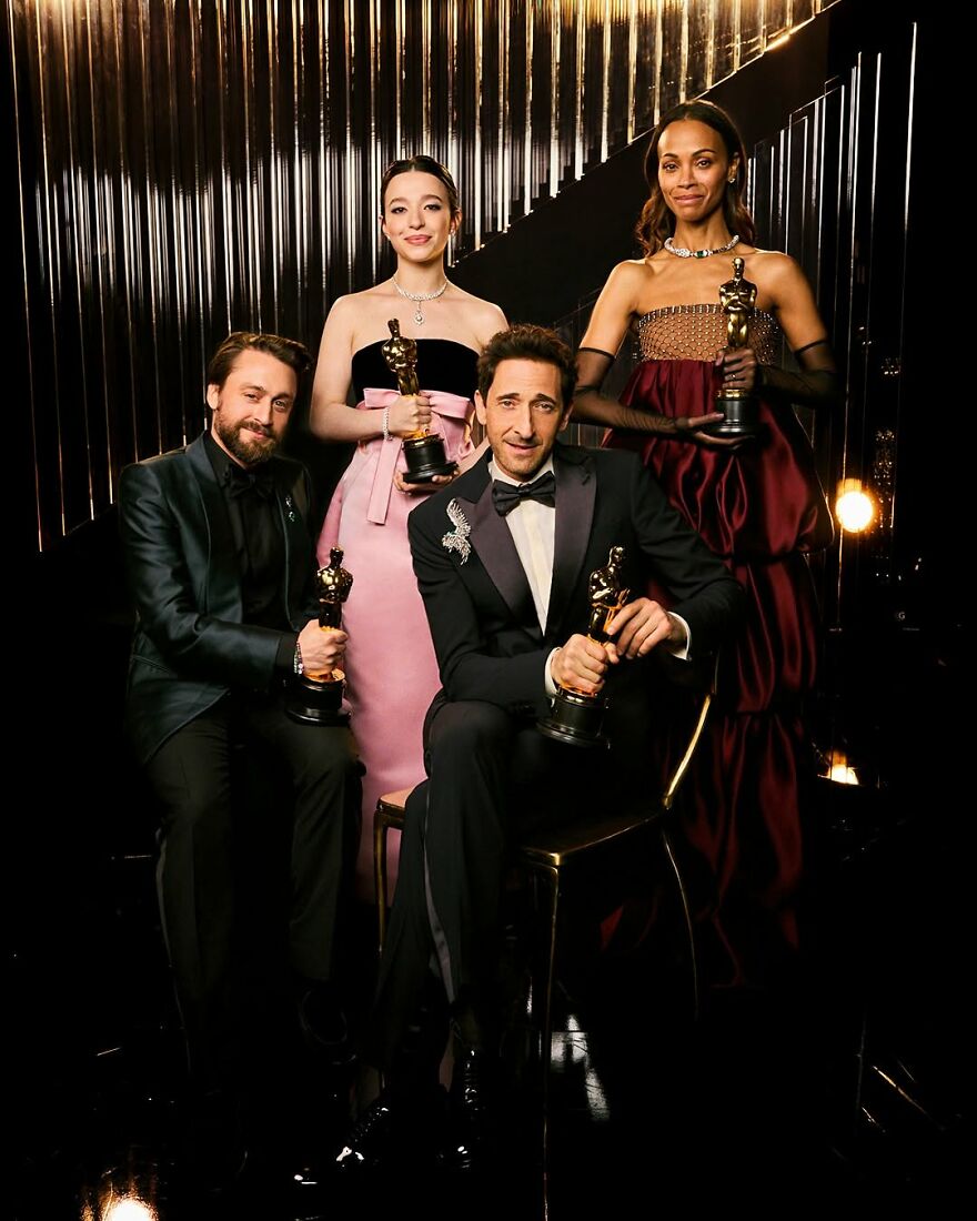 Four actors holding Oscars at a formal event, posing together with elegant attire, related to Oscars 2026 updates. Four actors holding Oscars at a formal event, posing together with elegant attire, related to Oscars 2026 updates.