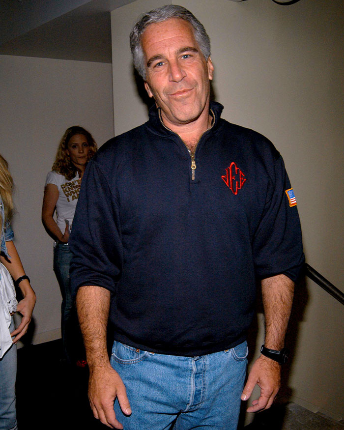 Man in casual clothing at an indoor event, related to exotic dancer's shocking allegations against Epstein and ex-Prince Andrew.