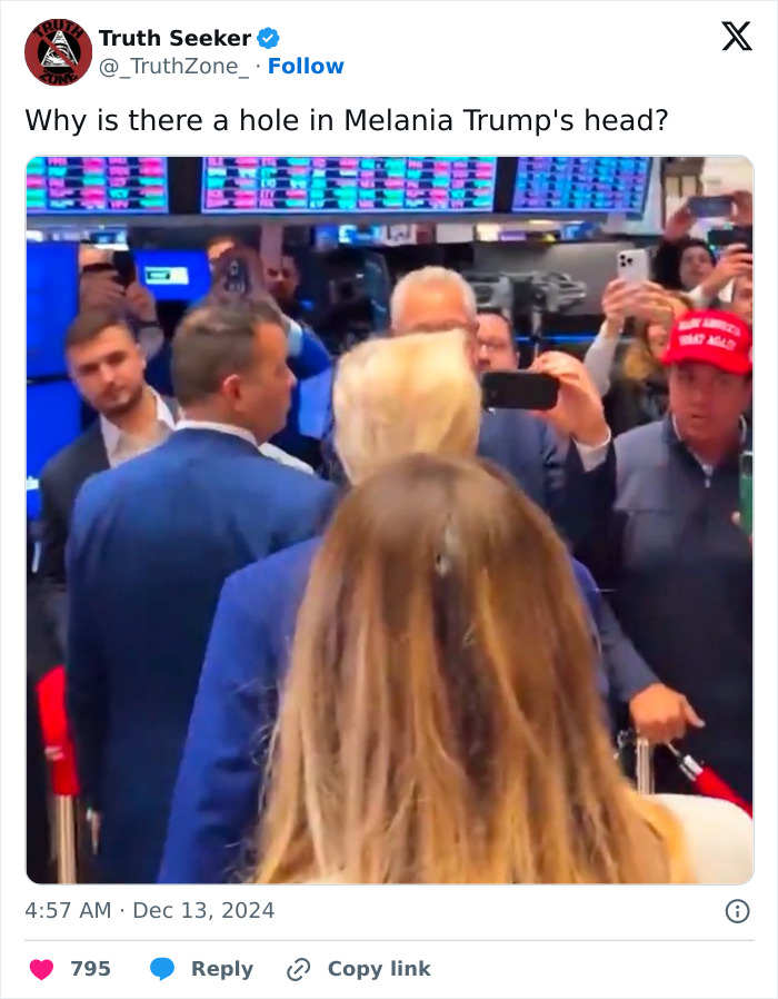 Crowd photo showing Melania Trump’s perfectly polished appearance slipping as the wind reveals a hidden hair detail.