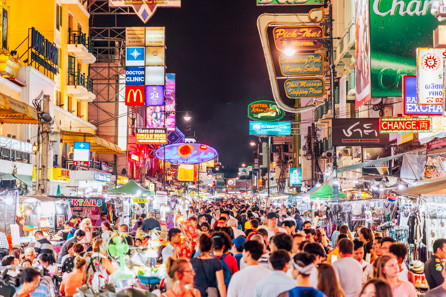 Bustling nighttime street market in a vibrant city known among the 15 cities in the world where sleep is optional