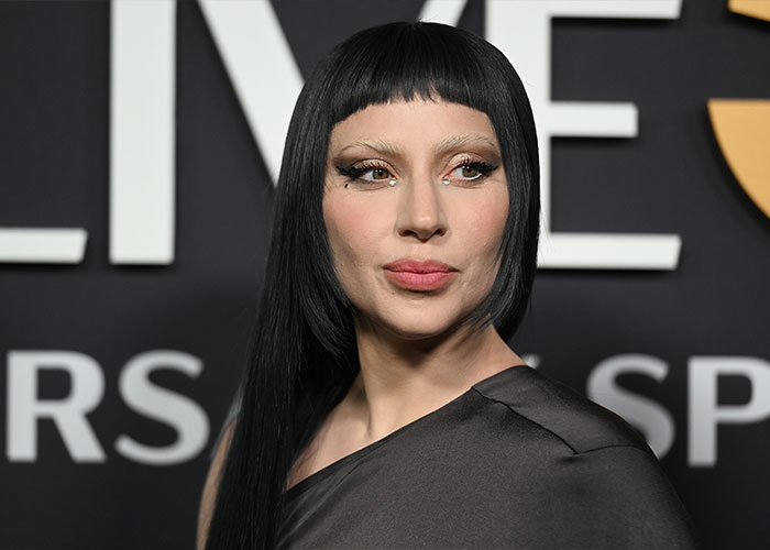 Lady Gaga at a red carpet event, spotlighted amid Epstein ties chatter as new files are released.