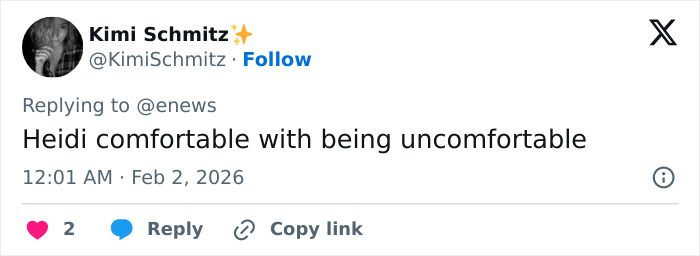 Tweet by user Kimi Schmitz saying Heidi comfortable with being uncomfortable, referencing Heidi Klum Grammys dress controversy.