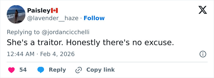 Twitter user Paisley with a Canada flag replying to a comment, calling Tate McRae a traitor over Team USA Olympics ad controversy.