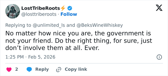 Tweet text discussing distrust in government, related to vet tech charged and fired after rescuing abandoned dog during snowstorm.