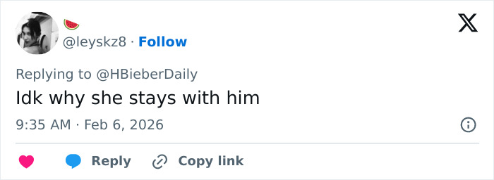 Tweet screenshot showing a user commenting on Justin Bieber abandoning wife Hailey at the Grammys, sparking fan controversy.