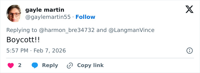 Screenshot of a social media reply showing backlash and threats, related to Amber Glenn’s beliefs controversy.