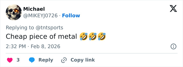 US figure skater holding broken gold medal after celebration, unable to keep it due to damage and event rules.