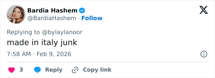 US figure skater holding a broken gold medal during a celebration, showing disappointment and frustration.