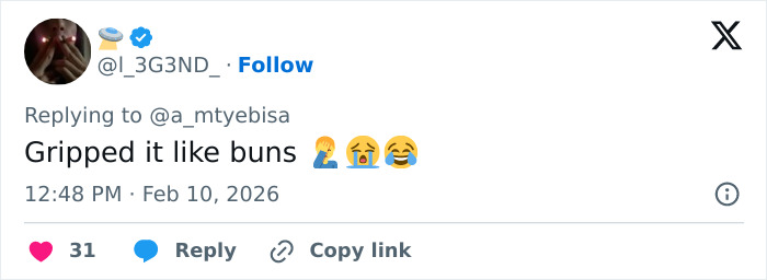 Tweet reaction to low-cut dress advertisement going viral for all the wrong reasons, featuring emojis and casual tone.