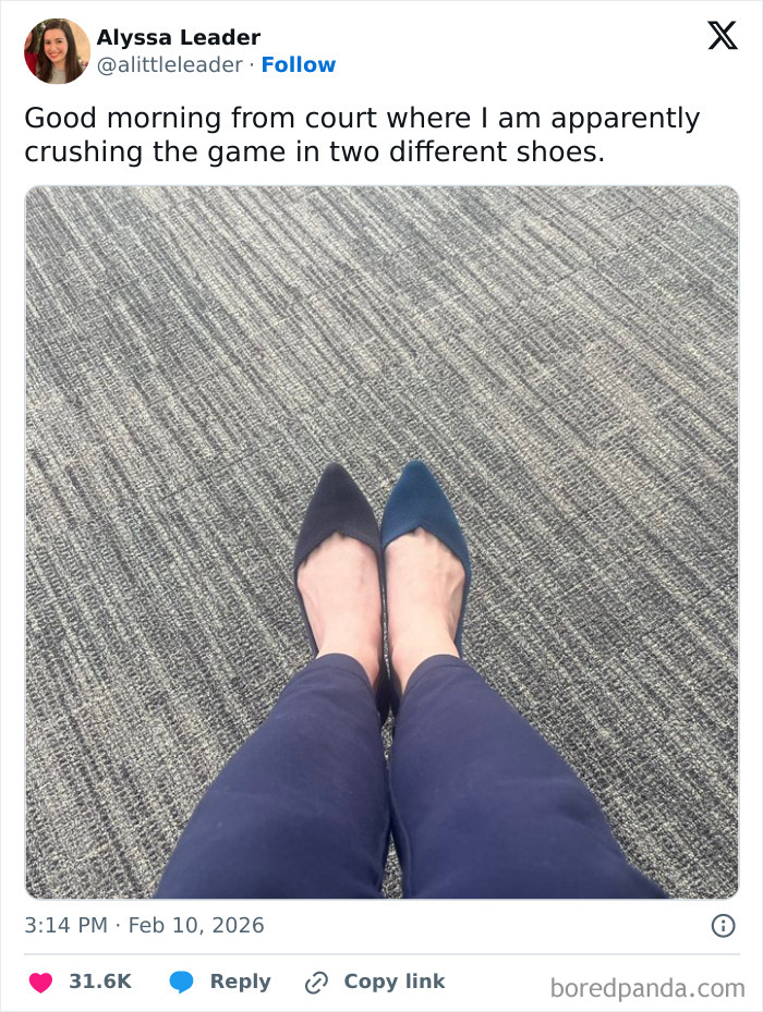 Person sitting on carpeted floor wearing two different colored shoes in a chaotic and hilarious coping humor X post.