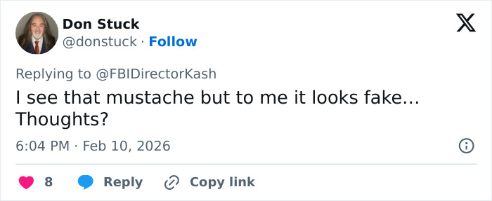 Screenshot of a social media comment questioning the authenticity of the mustache on the Nancy Guthrie suspect image released by FBI.