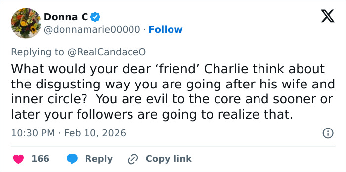 Tweet reply criticizing Candace Owens for attacking Erika Kirk, highlighting controversy and calls for police questioning.