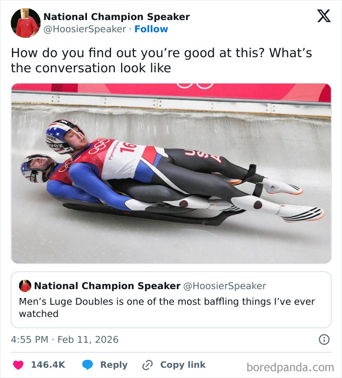 Two athletes in team luge racing suits and helmets sliding on an icy track at the 2026 Winter Olympics event