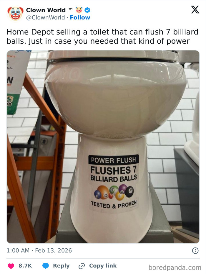 Toilet with a humorous sign claiming it can flush 7 billiard balls, showcasing chaotic and hilarious X posts humor.