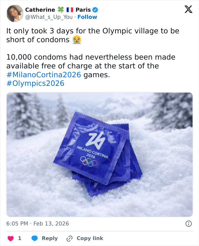 Blue Milano Cortina 2026 condoms stacked on snow, highlighting Olympic village running out of rubbers in 3 days.