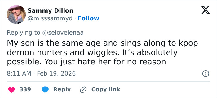 Tweet screenshot of Sammy Dillon defending Hailey Bieber's toddler son, mentioning singing along to K-pop and demon hunters.