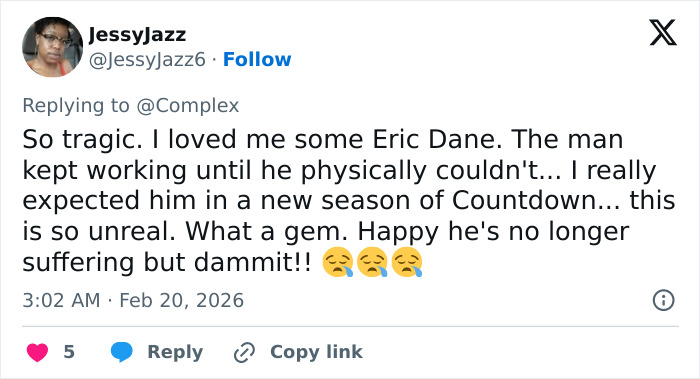 Screenshot of a fan's emotional Twitter reply mourning Eric Dane’s last post before his tragic passing at 53.