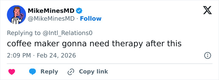 Screenshot of a social media reply about a hotel's unusual underwear washing hack sparking influencer backlash.