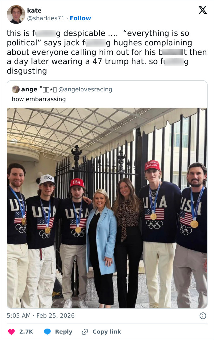 Team USA men's hockey players wearing medals and USA sweaters, with one wearing a political hat at the White House. Team USA men's hockey players wearing medals and USA sweaters, with one wearing a political hat at the White House.