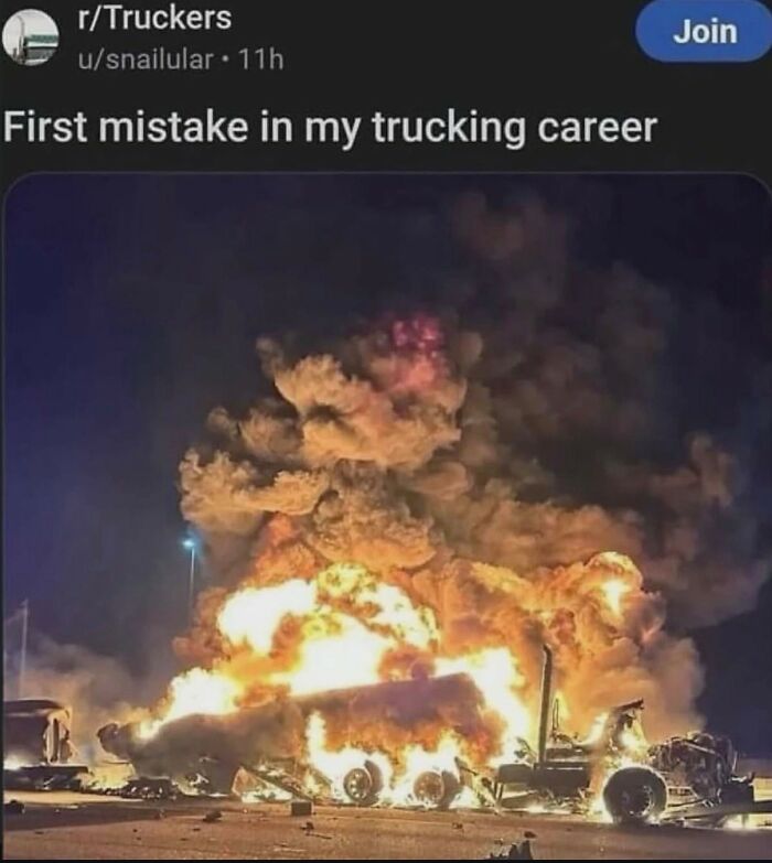Truck engulfed in flames in a dark setting, illustrating a hilarious meme with a hint of cynicism about trucking mistakes.