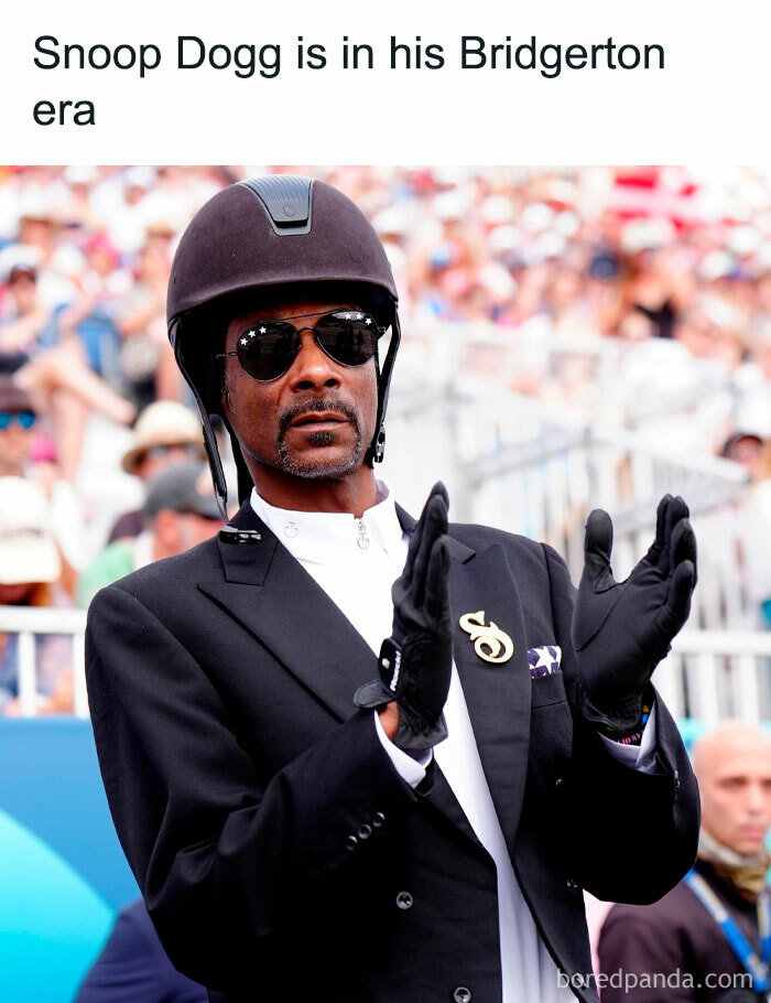 Snoop Dogg wearing equestrian attire and sunglasses, clapping with a crowd in the background in a Bridgerton meme.
