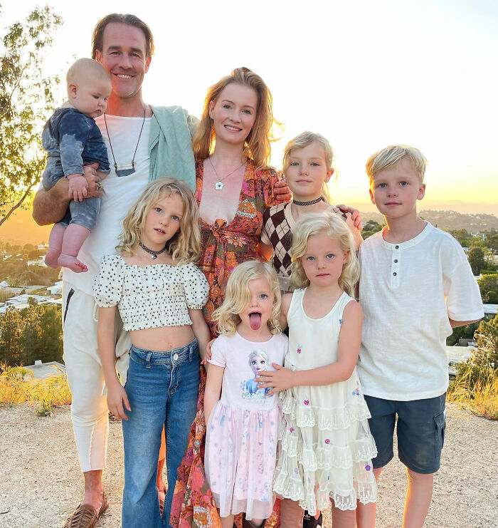 Family outdoors at sunset, highlighting awareness and hope for colon cancer breakthrough and research progress.