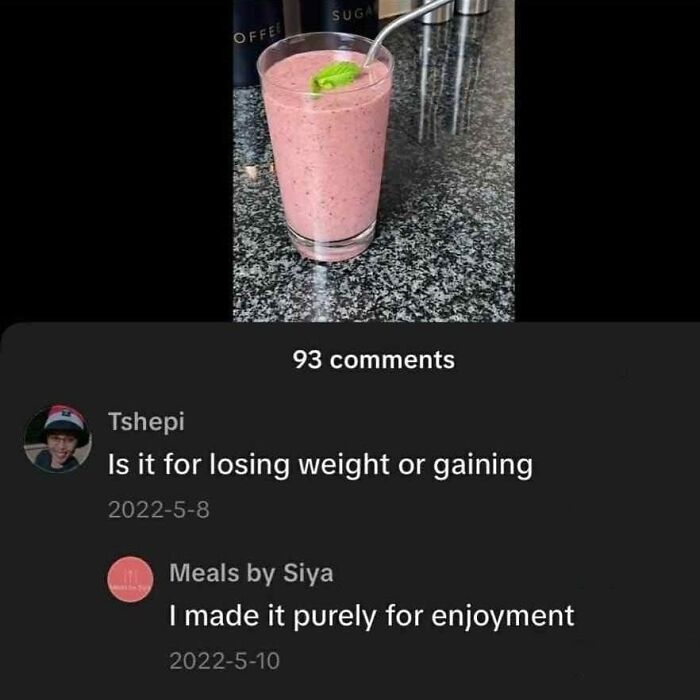 Comment exchange under a pink smoothie photo showing 93 hilarious memes with a hint of cynicism about food choices.