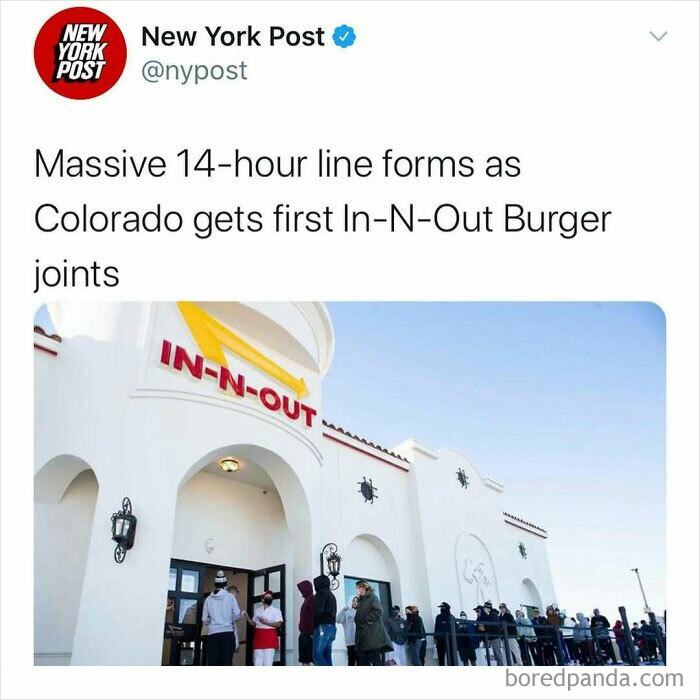 People waiting in a long line outside In-N-Out Burger in Colorado, illustrating unhinged news headlines in America.