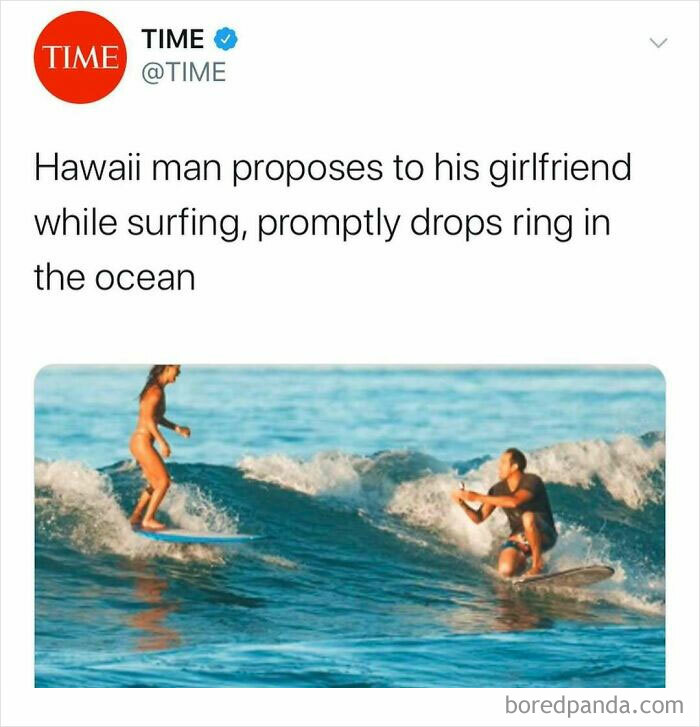 Tweet from TIME about a Hawaii man proposing while surfing and accidentally dropping the ring in ocean, showcasing unhinged news headlines.