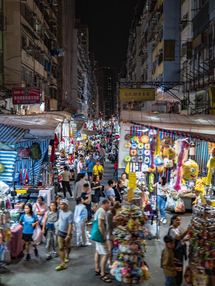 Bustling night market scene in a city known for its vibrant nightlife where sleep is optional for locals and visitors.