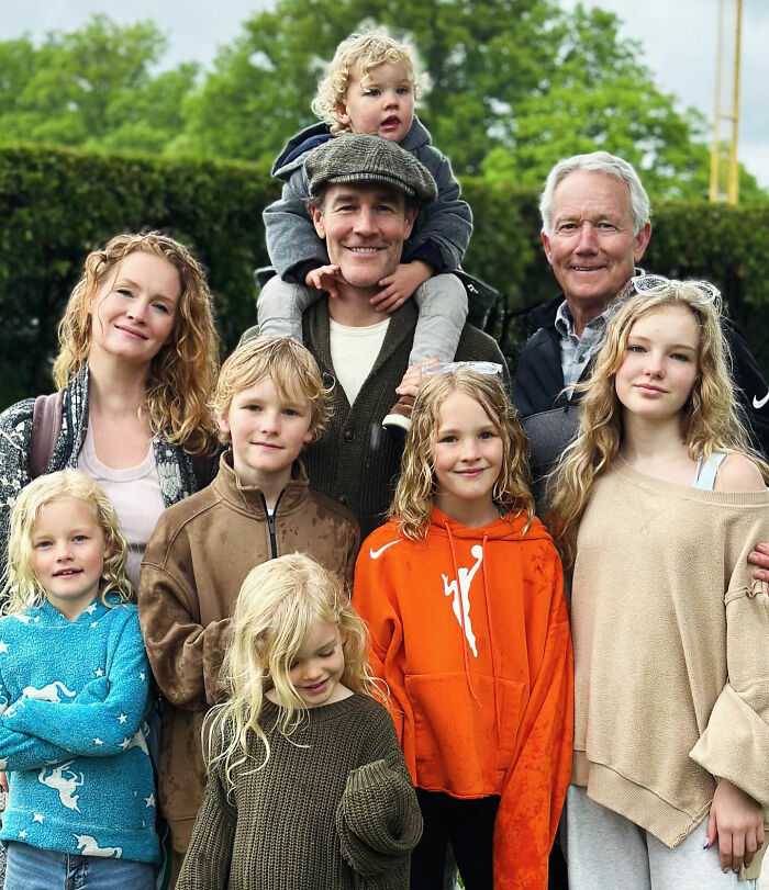 Group photo of Alfonso Ribeiro and family outdoors, capturing a heartfelt moment linked to Alfonso Ribeiro and James Van Der Beek.