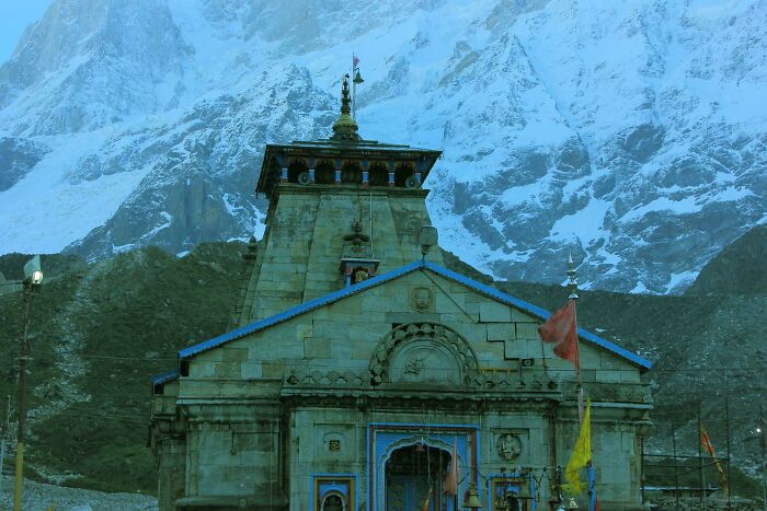 Ancient temple in the Himalayas representing spiritual tourism and cultural journeys across India&rsquo;s sacred sites.