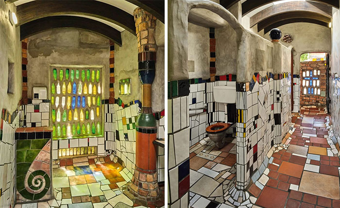 Bold and beautiful interior bathroom design with colorful mosaic tiles and stained glass windows under wooden beams