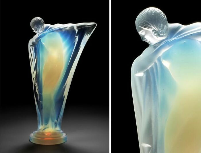 Glass sculpture with ethereal blue and amber tones, displayed as a fascinating historical artifact in the museum of artifacts.