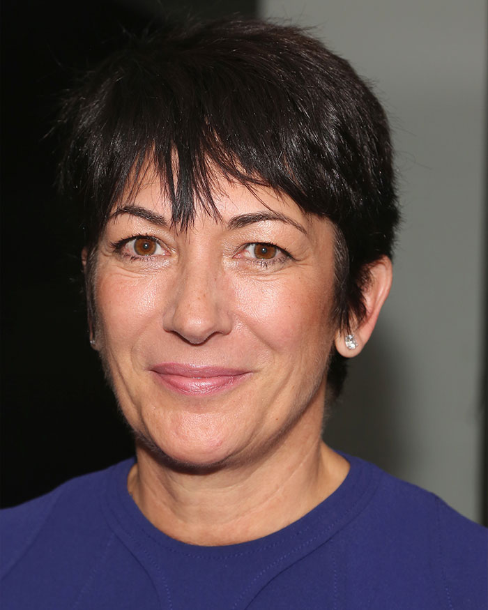 Close-up of Ghislaine Maxwell with short dark hair and brown eyes in a blue top, related to Madeleine McCann abductor sketch debate. Close-up of Ghislaine Maxwell with short dark hair and brown eyes in a blue top, related to Madeleine McCann abductor sketch debate.